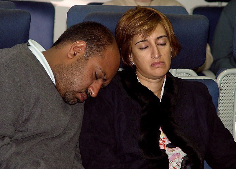 Sleeping in the Airport <br> by Terry Straehley