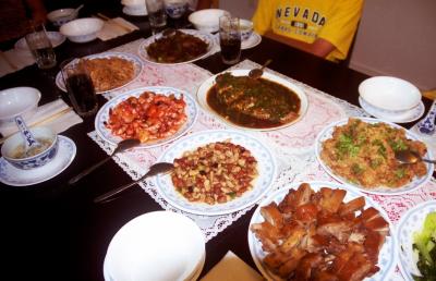 A dinner in the Zhou's in Ottawa, Aug 2002.