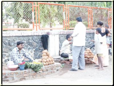 People selling offerings to the Gods