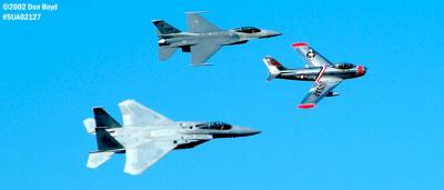 Heritage Flight of Ed Shipley's F-86 Sabre leading USAF F-15C and F-16C military aviation air show stock photo