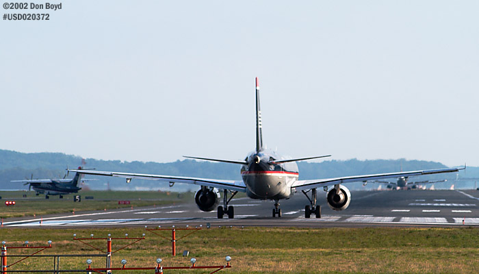US Airways DO-328 and A319 aviation stock photo