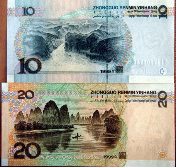 10 Yuan note with the Yangtze River Gorges and the 20 with Guilin karst formations