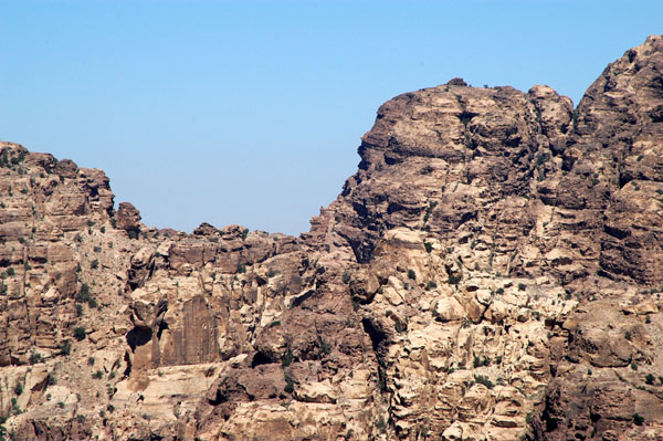 Looking across at a distant side view of the Monestary on the other side of Petra