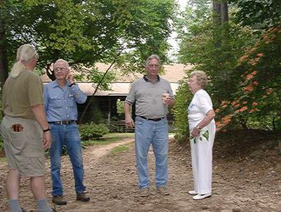 John, Tom, Dan, Caroline in front of the cabin