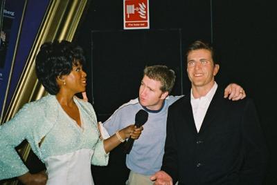 Clint butting in on Oprah and Mel.