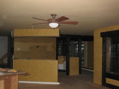 He put one fan/light up in the den, the rest have to wait until we paint the downrods and get some beams up in the rooms.