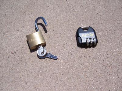 Two locks are provided for locking the bag to the rack, and locking the zippers