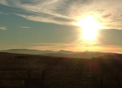 The sun sinks towards the Maidens Paps .jpg