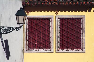 Twin windows with lone lamp