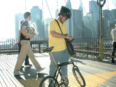 Brooklyn Bridge, Manhattan-side tower platform, looking Southwest.  The yellow deck markings separate the bicycles from the pedestrians.