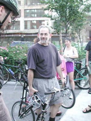 Swift Folder's Peter Reich demos one of his creations for the crowd at the festival (Thompson & Broome Streets)