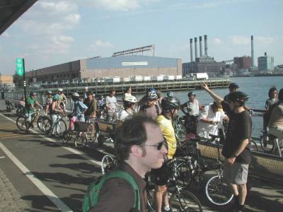 The group stops along the East Side Bikeway in order to enjoy the view