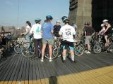 Ride leader Hannah Borgeson,conversing with unidentified STAFF member at the Manhattan tower of The Brooklyn Bridge. Look at that sky! Mother Nature sent a beautiful day.