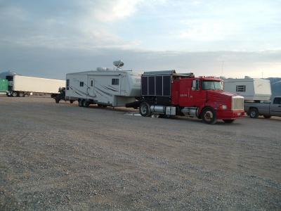 Sweet setup ... semi towing a 35' camper ... towing an ATV.