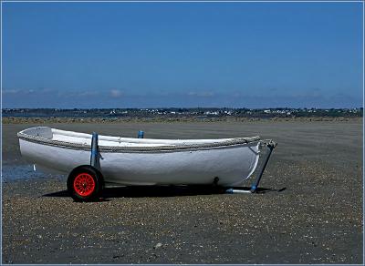 the white small boat