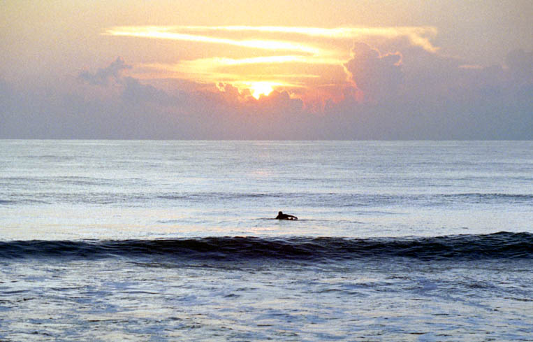 Surfing at Sunrise.