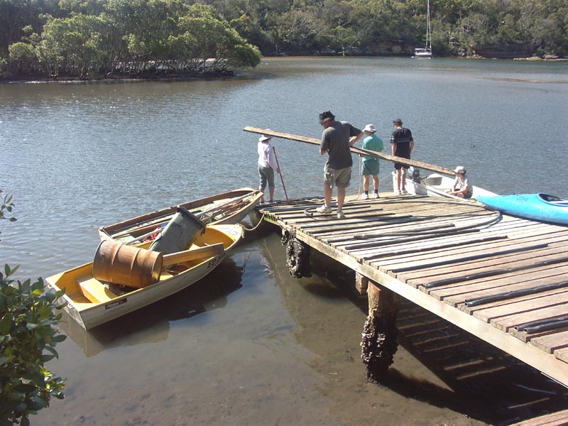 Low tide working bee at the boatshed