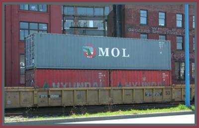 Stacked containers in downtown yard.