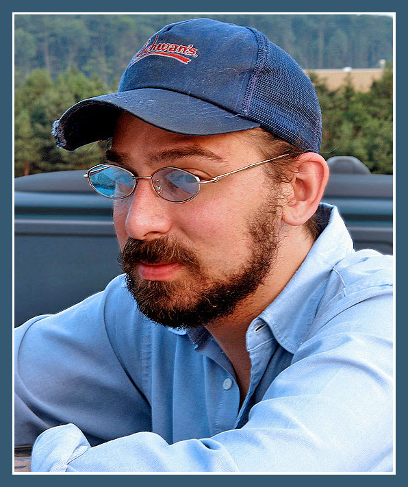 Young Man with Old Blue Hat