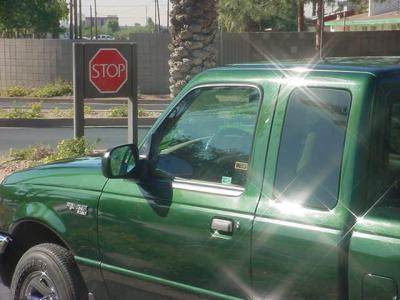 Green Truck Club at stop sign with 4 stars