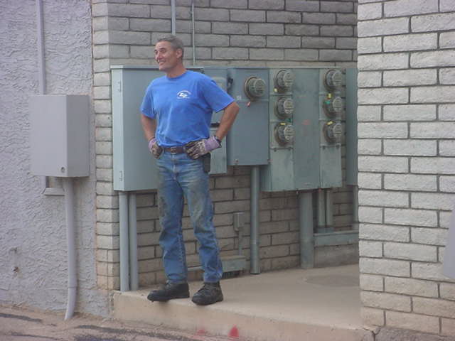 worker with power panel background