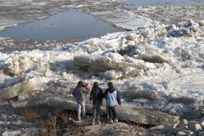 Curious children eye the ice