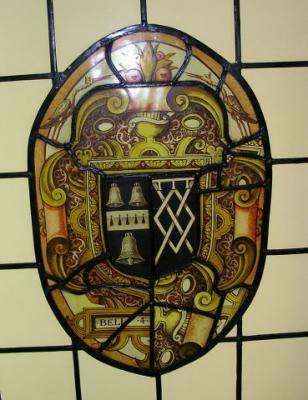Stained glass showing a coat of arms