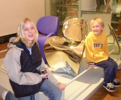 Julie, a stainless steel chair, and a goofy looking Luke