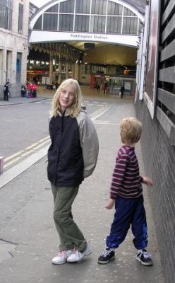 Posing in front of Paddington Station