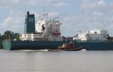 Ship and Tugboat in Mississippi River