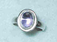 Amethyst cabochon set in sterling silver.