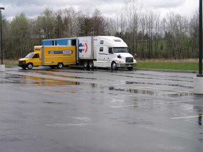 Penske and North American Trucks getting ready to load