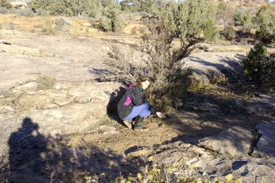 Collecting a sand sample to bring home