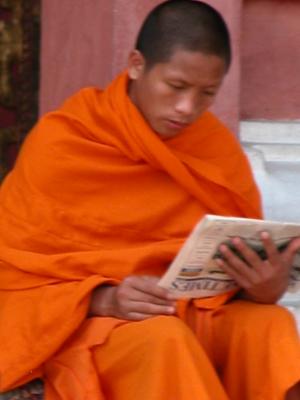 Monk reading - Luang Prabang.JPG