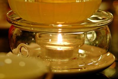 A pot of warm tea in a cold winter evening