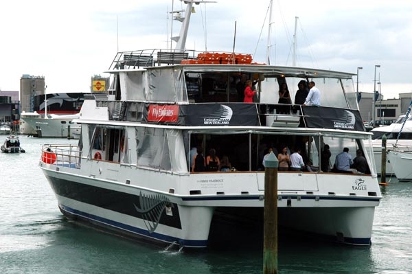 Emirates Team New Zealand banners on this boat in Auckland Harbour