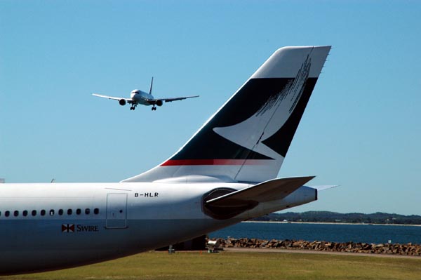 Cathay Pacific A330 in Sydney with an arriving Qantas 767