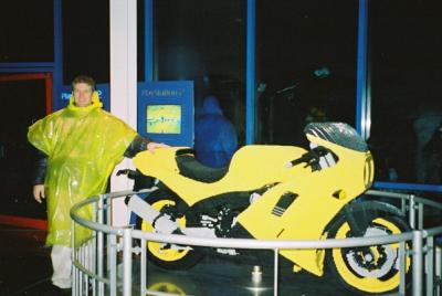 Clint and an impressive version of a motorcycle that colour co-ordinates perfectly with his poncho.
