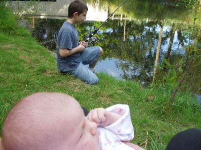 Jessica watches us fish