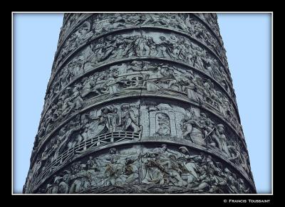 ...details of the bronze spiral cast encasing the stone column