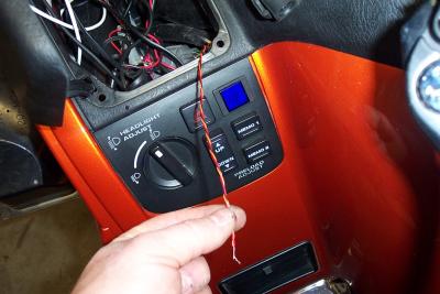 I routed the three serial wires out by the glove box and then spliced them back to the other end of the remote cable