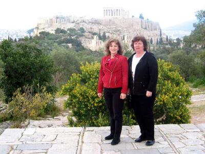 Roe and Ger pose with Acropolis as backdrop.JPG