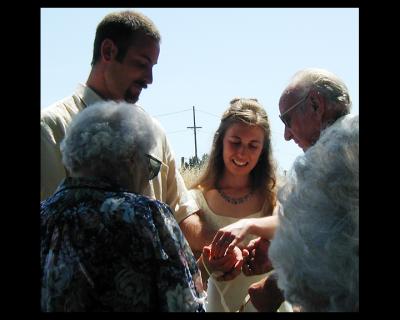 Their custom ceremony included string.
TieKnot_P6220026-square.jpg