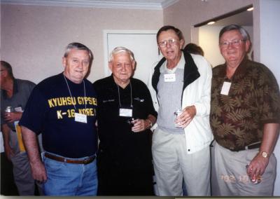 Jack Hayslett , Heinie Aderholt, Bill Kailles, and President Dave Jordan   socialize at Dayton hospitality room....