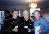 Sharon Bishop, Heinie Aderholt, Norm Happel in hospitality room at Dayton