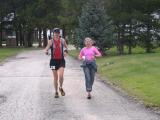 Leah leads Scott down from the aid station