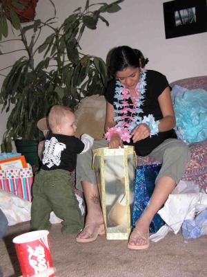 Dylan helping Stacy open her presents