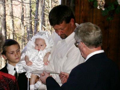 Emily's christening On the mountain Doug and Phill's Uncle John performs the ceremony.