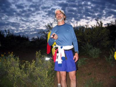 Mark Bodamer scans the horizon with his single LED flashlight as he tries to recall the trail from 10 years ago