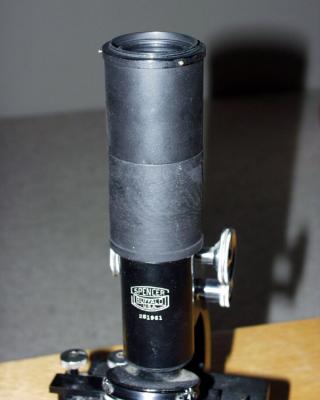 Eyepiece and adapter atop old Spencer microscope.
Note new top tube section to take 2 eyepiece.